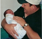 1999-10-28-pa-holding-savannah-in-the-hospital-when-she-was-born