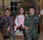 2009-12-25-luke-and-scott-decked-out-for-duck-hunting-and-savannah-ready-for-a-ride-in-the-cold-on-her-new-saddle