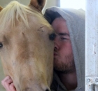 2015-10-cody-taking-care-of-our-10-month-old-palomino-colt