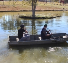 johnathan-cody-rowing-out-to-weed-eat-the-island